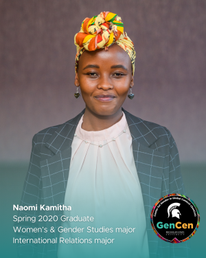 Naomi in a colorful headscarf, white blouse, and black checkered blazer.
